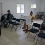 Iglesia Bautista Enmanuel de Loma Colorada staff testing new sound equipment & chairs we sent.