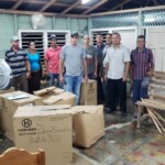 Several pastors from Baracoa churches pickup their donations at a distribution stop